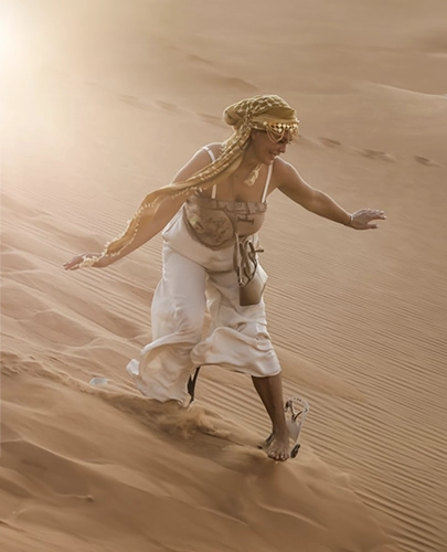 Tourist Sandboarding in Doha Desert