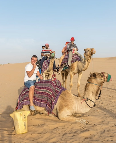 Tourists enjoying camel safari